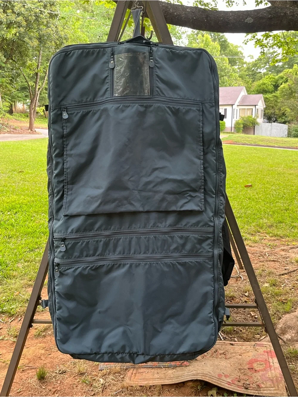 American Tourister Navy Garment Bag with Shoulder Strap Great condition.